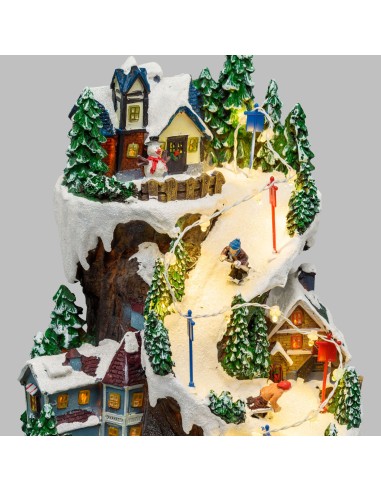 GIOSTRINE E VILLAGGI: vendita online Villaggio Innevato con Sciatori e Trenino in Movimento - Musica e LED H38cm in offerta