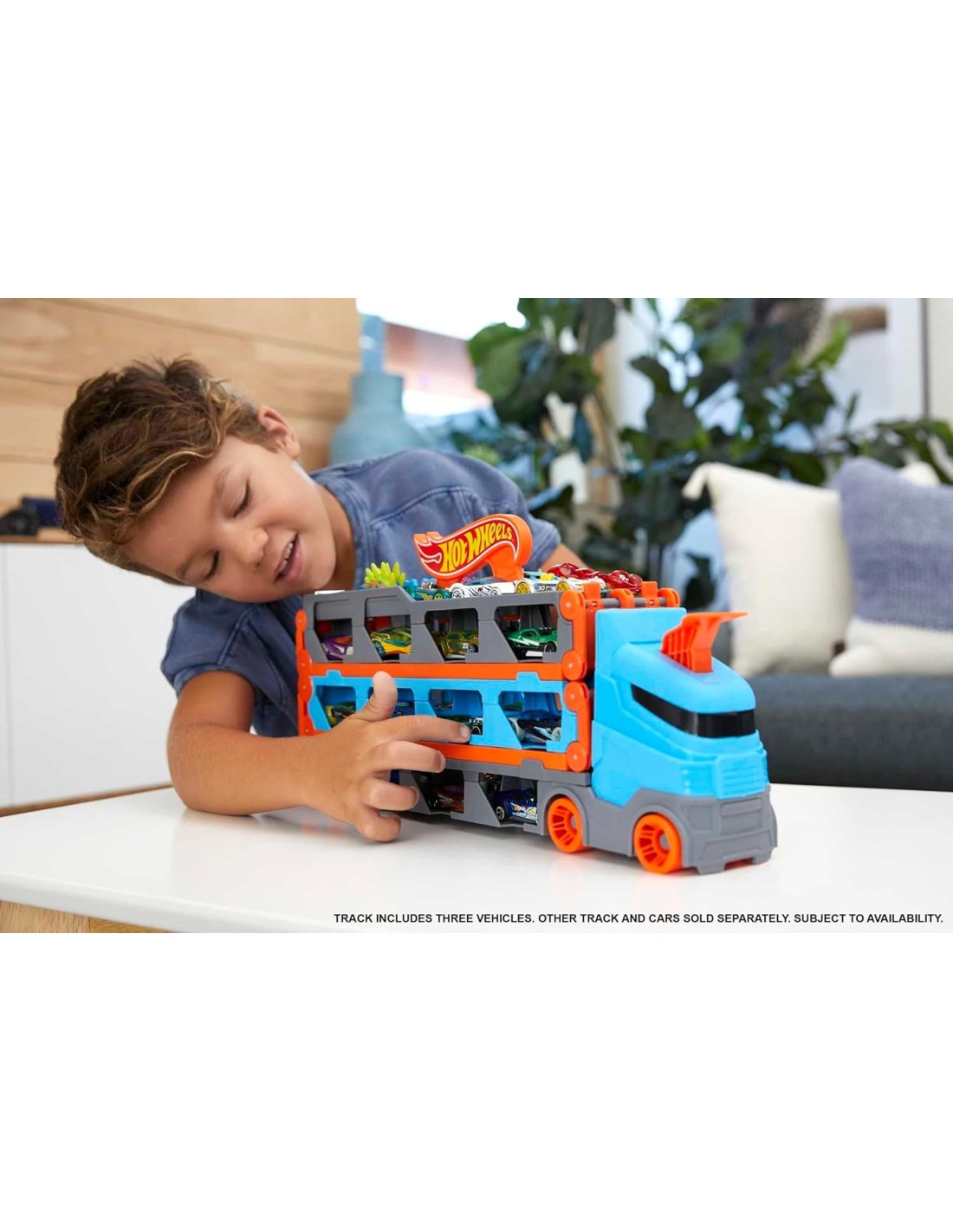 Hot Wheels Camion 2 in 1 Trasportatore e Pista con 3 Macchinine | Shopincasa.it