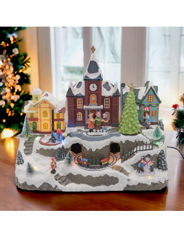 GIOSTRINE E VILLAGGI: vendita online Villaggio di Natale Innevato con Chiesa 34x27cm, Trenino e Giostra Rotanti, Albero Lumin...